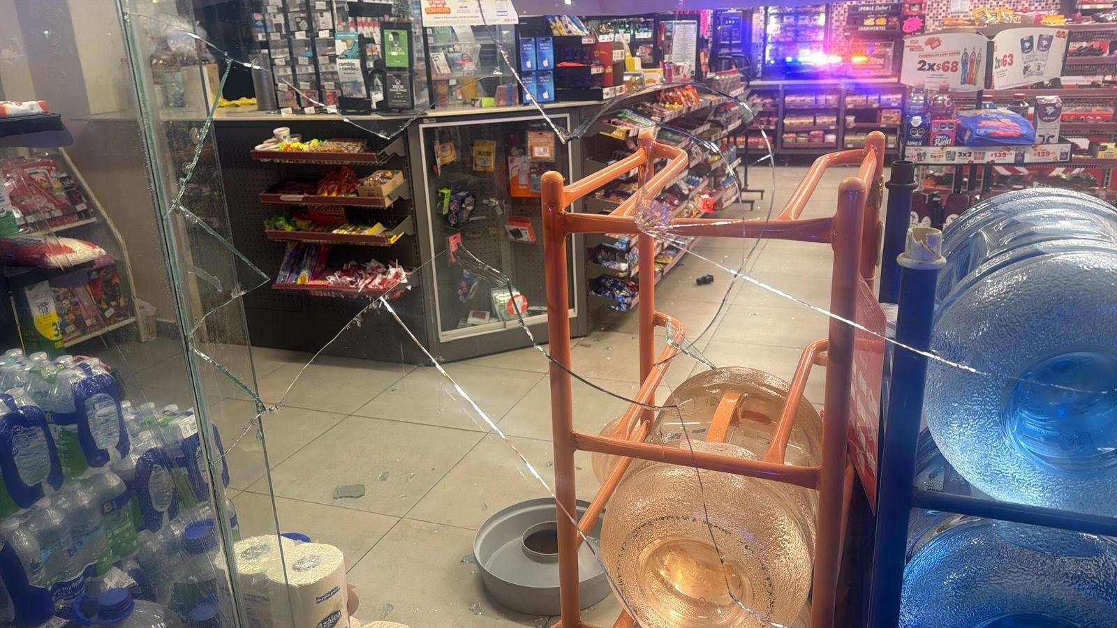 Detienen a doce por saquear tiendas